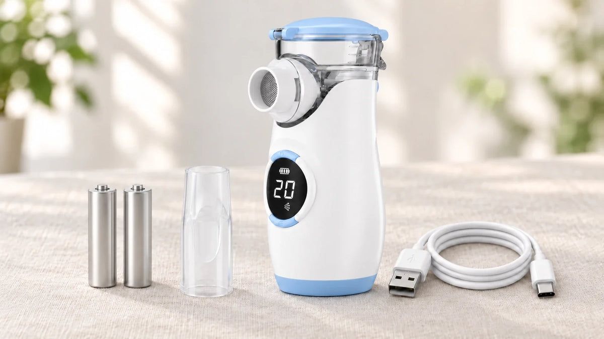 Mayluck MY135 rechargeable nebulizer beside AA batteries and a USB cable